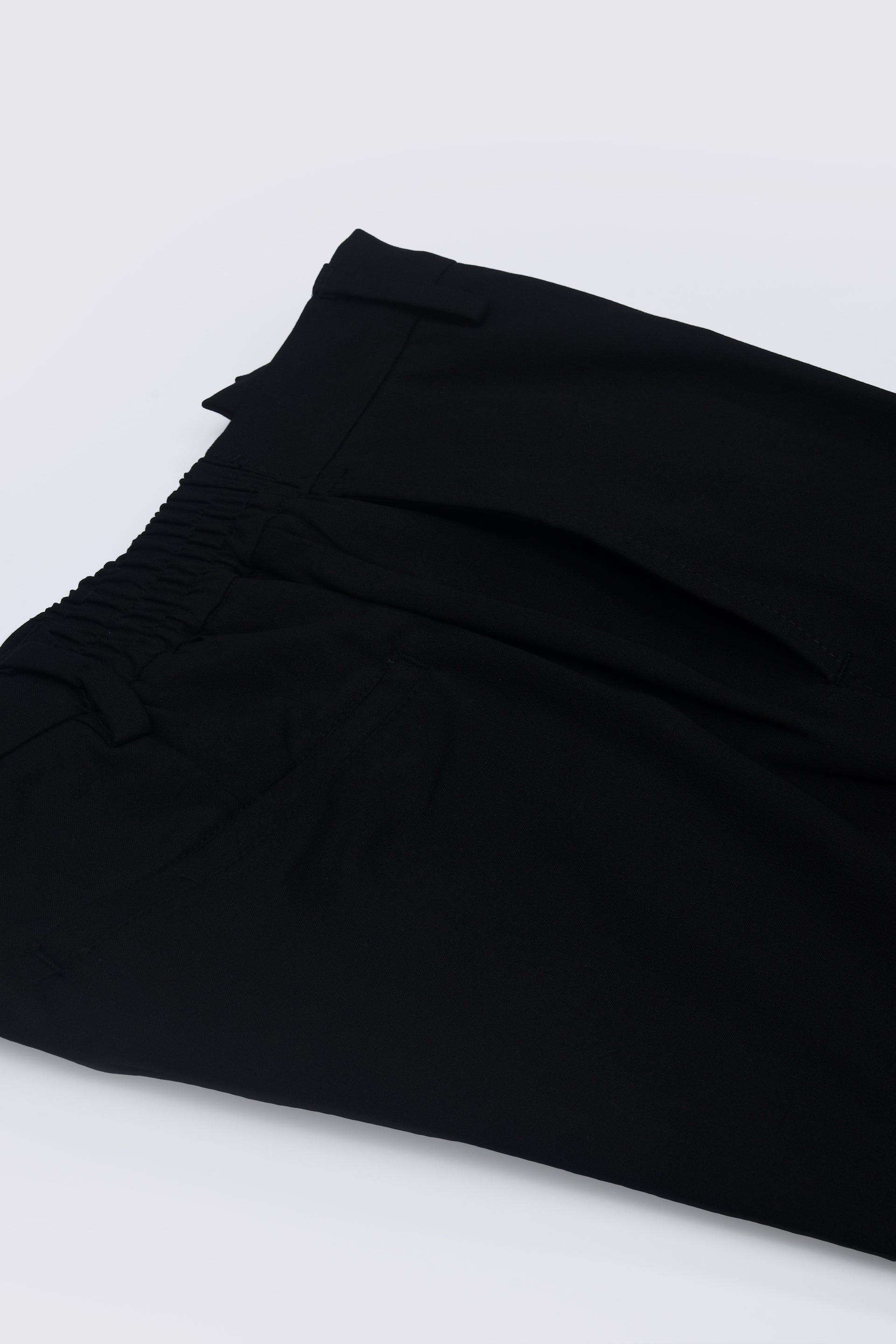 SOFT IRON RELAXED TROUSERS IN BLACK