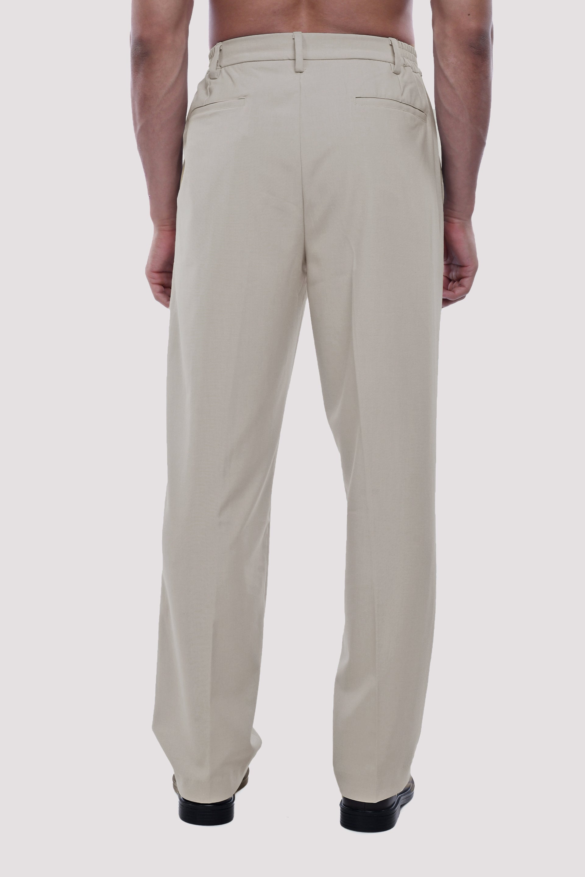 SOFT IRON RELAXED TROUSERS IN CREAM