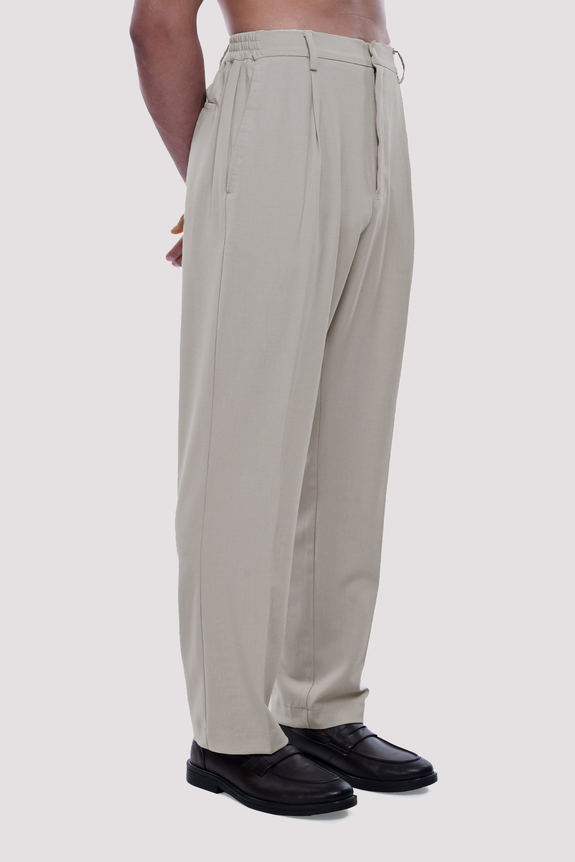 SOFT IRON RELAXED TROUSERS IN CREAM