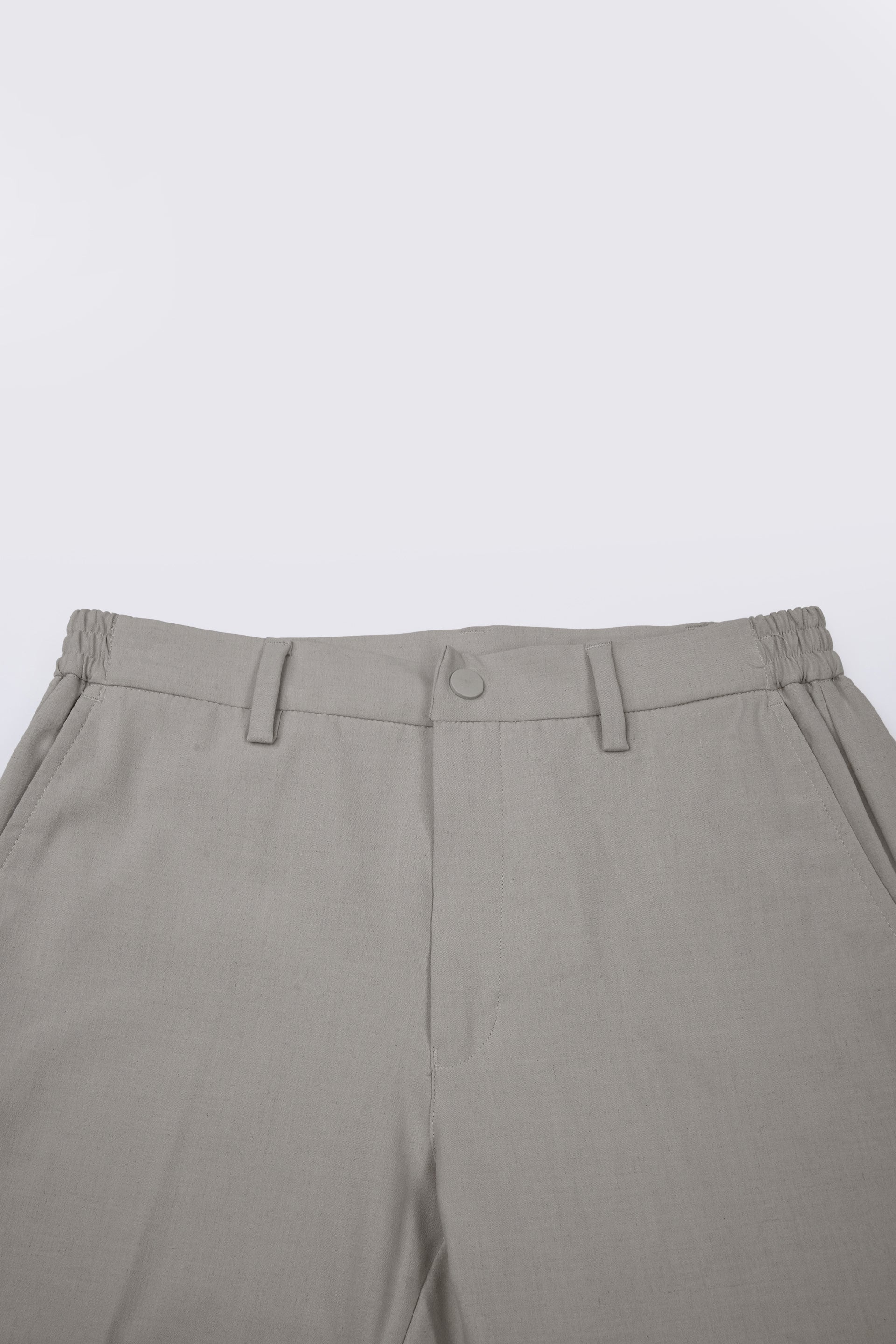 SOFT IRON RELAXED TROUSERS IN CREAM