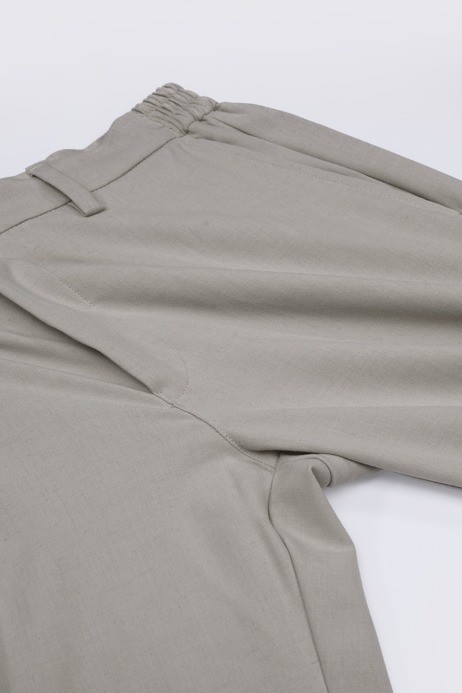 SOFT IRON RELAXED TROUSERS IN CREAM