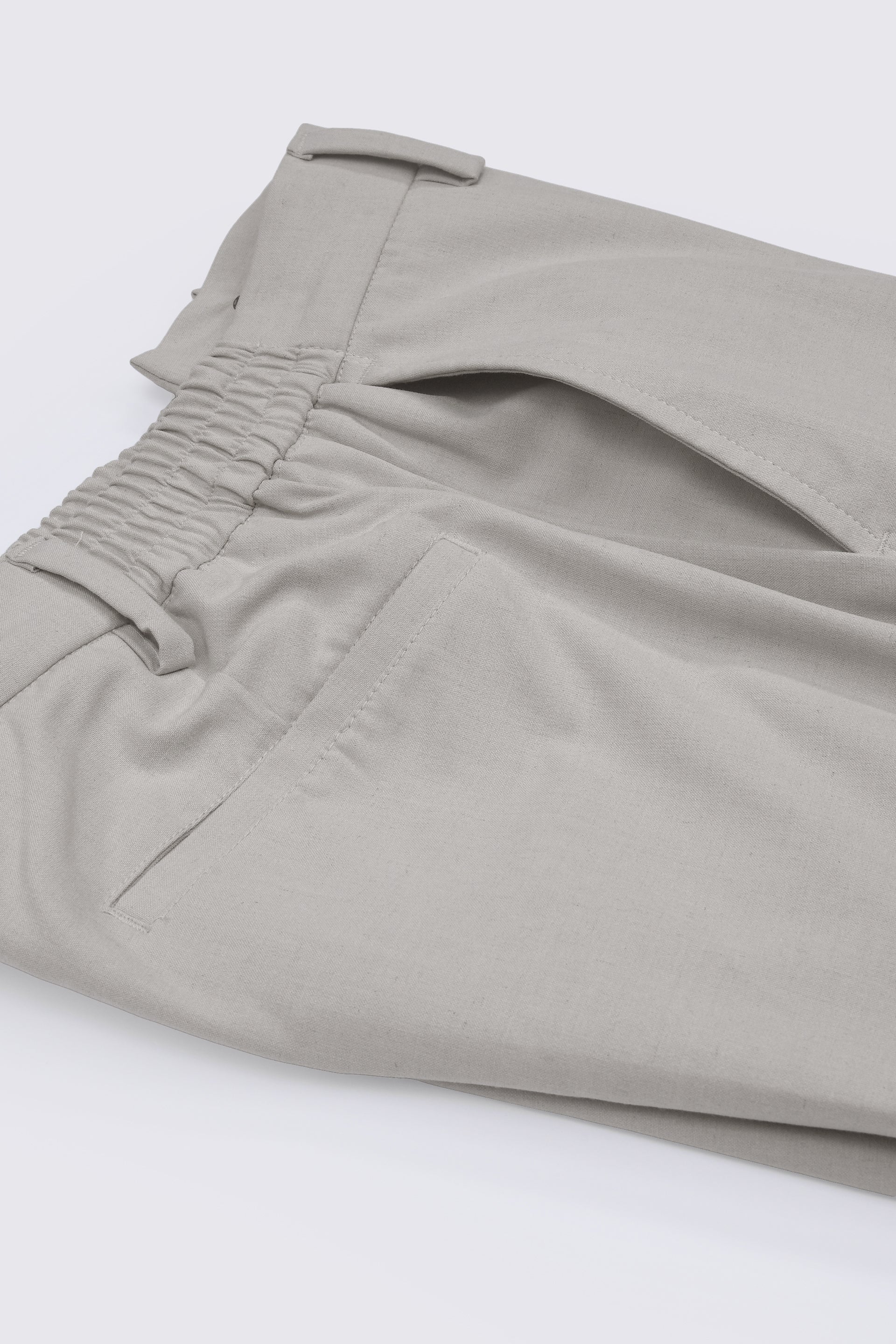 SOFT IRON RELAXED TROUSERS IN CREAM