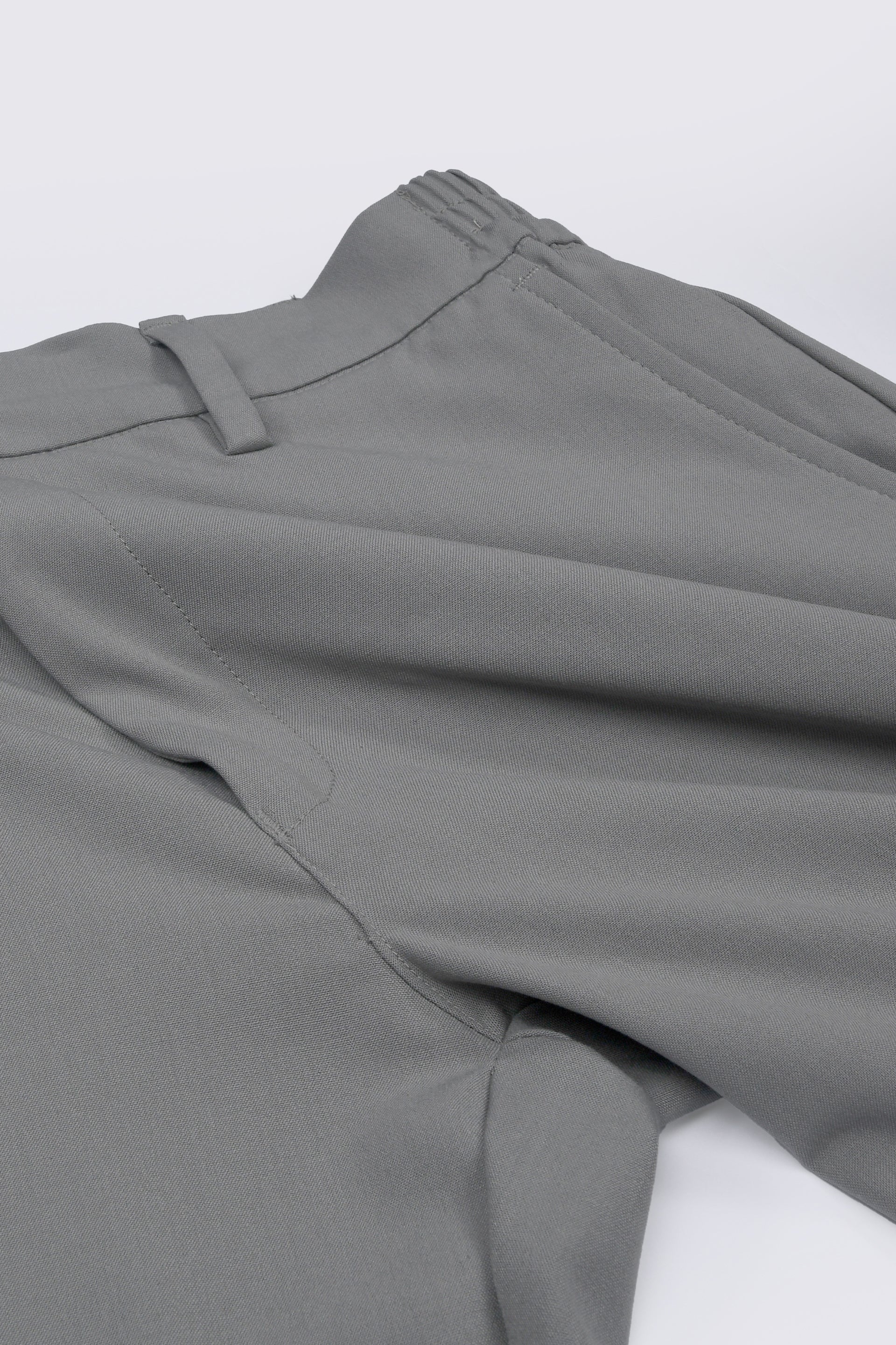SOFT IRON RELAXED TROUSERS IN LIGHT GREY