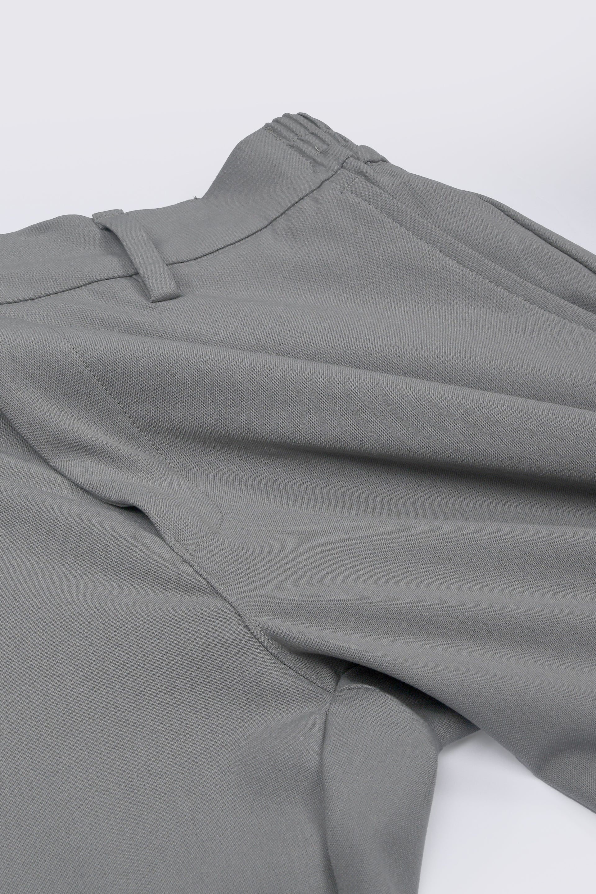 SOFT IRON TAILORED TROUSERS IN LIGHT GREY