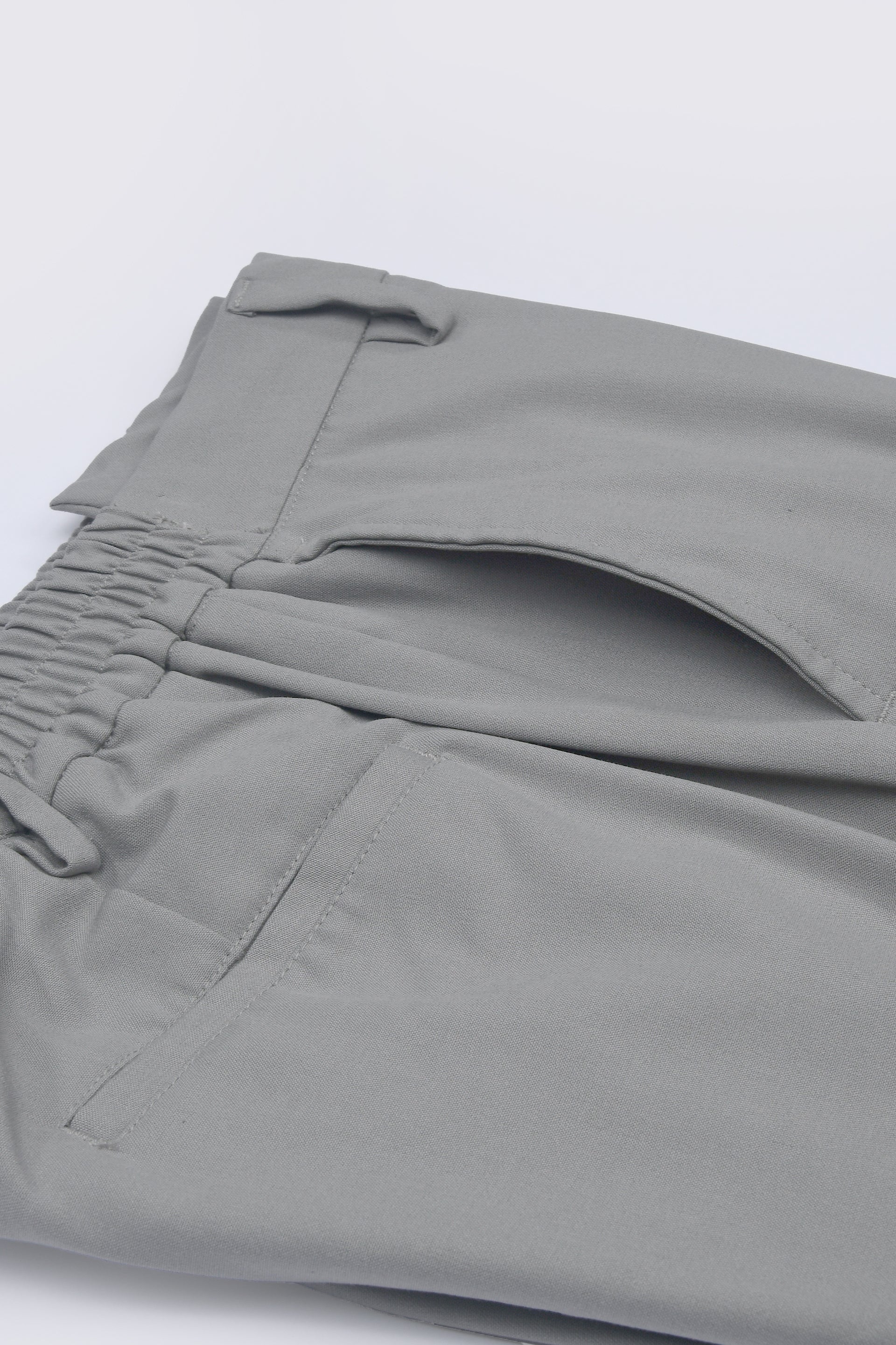 SOFT IRON TAILORED TROUSERS IN LIGHT GREY