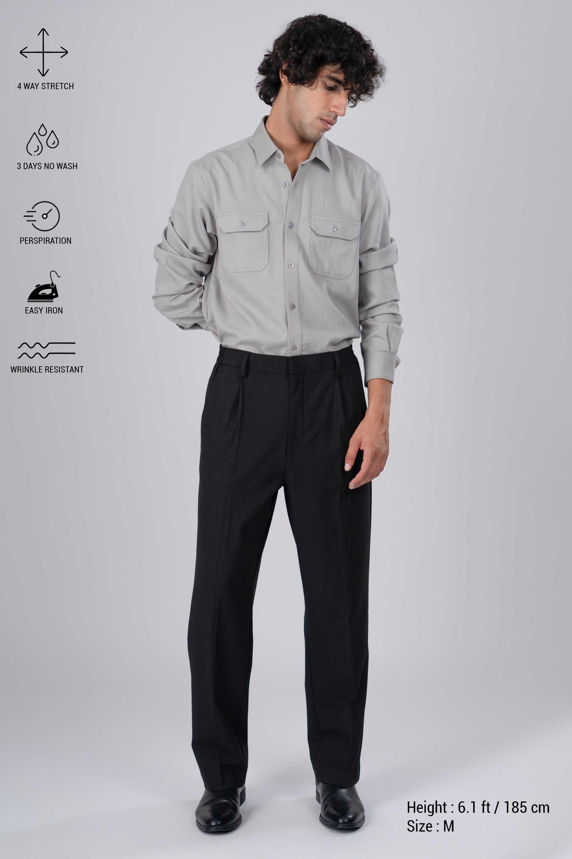 Soft Iron Flexi Pinstriped Relaxed Pant In Black