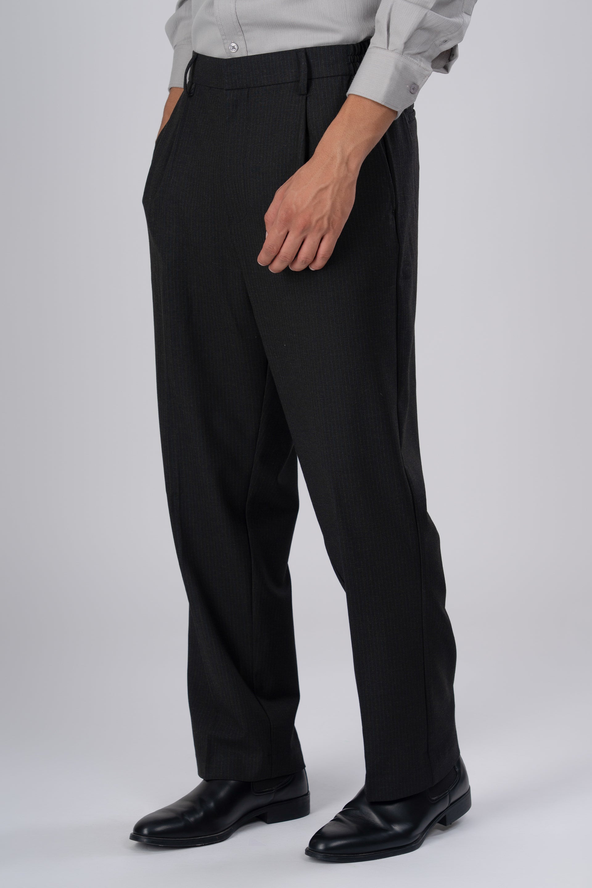 Soft Iron Flexi Pinstriped Relaxed Pant In Black