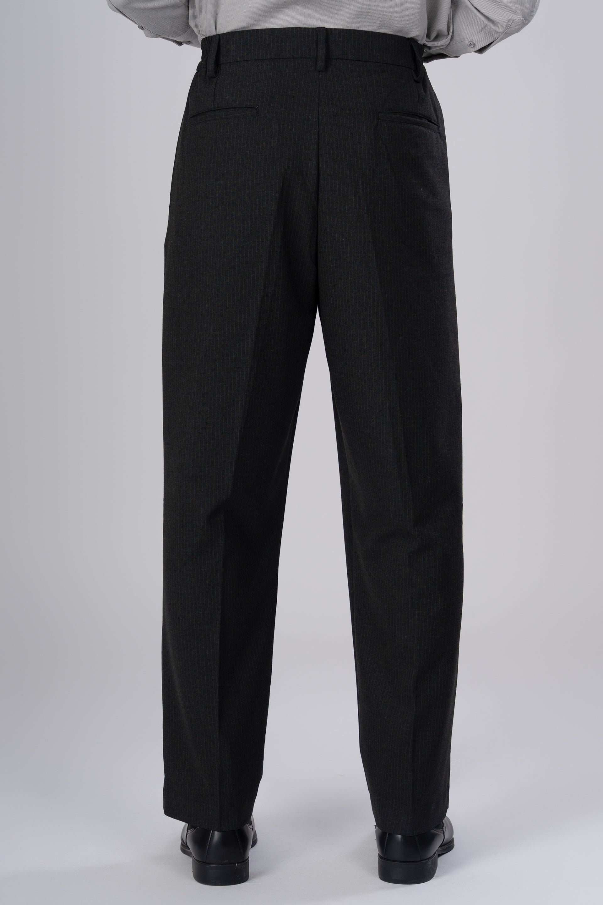 Soft Iron Flexi Pinstriped Relaxed Pant In Black