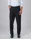 Easy Iron Pinstriped Relaxed Trousers In Black