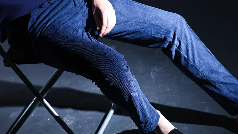 lose-up of rich-textured corduroy fabric showcasing its durability and softness.