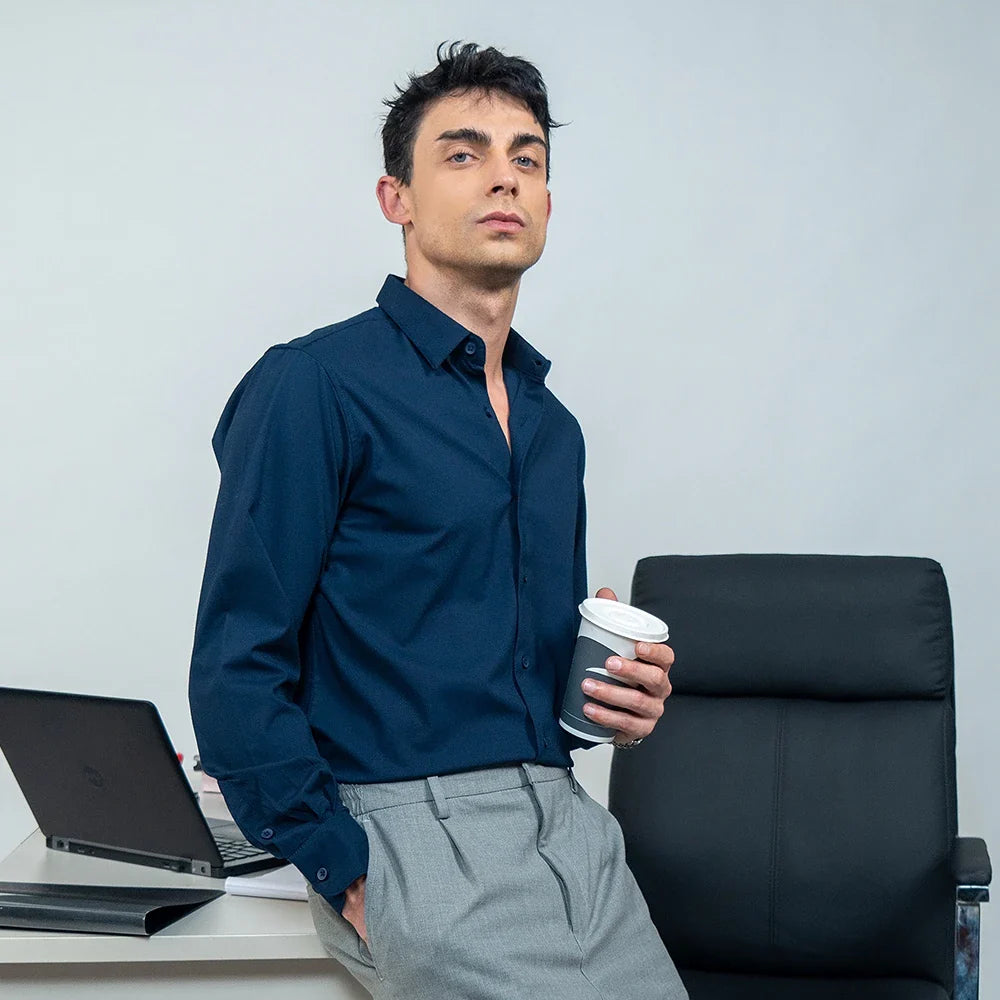 A confident man in well-tailored workwear, ready to own the room—sharp, functional, and built for performance.