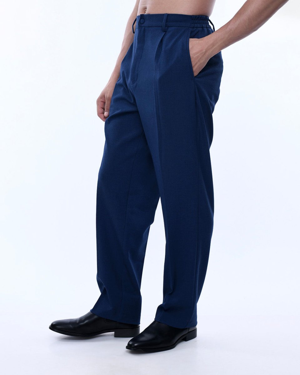 What is the difference between relaxed fit and regular fit trousers?