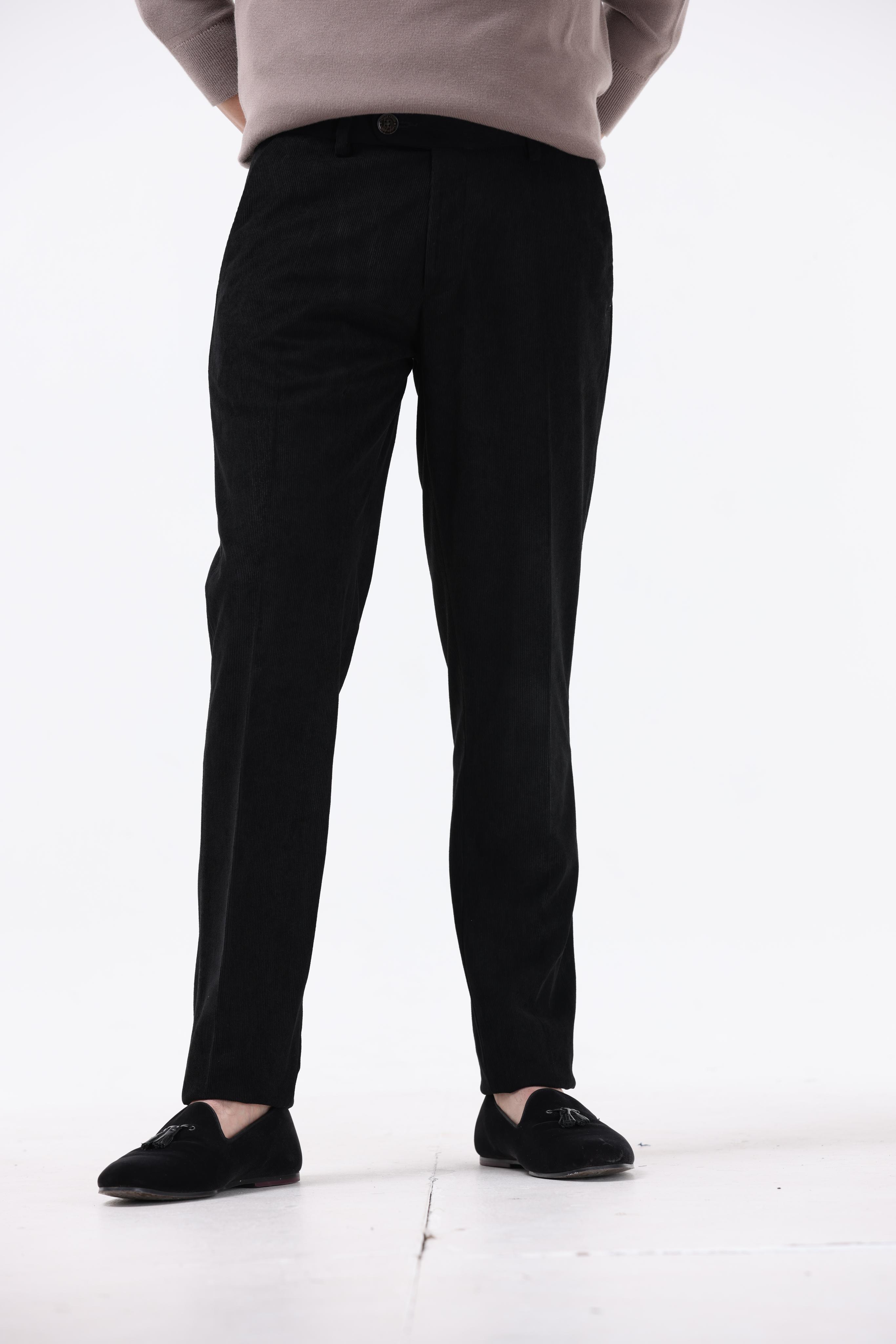 STATEMENT CORDUROY TROUSERS IN BLACK