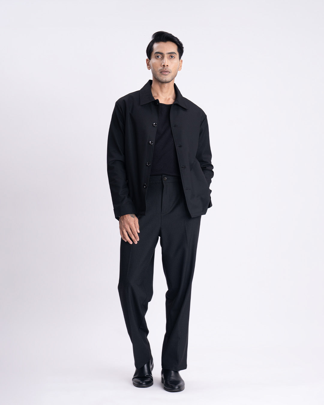 Soft Iron Flexi Pinstriped Relaxed Pants In Black