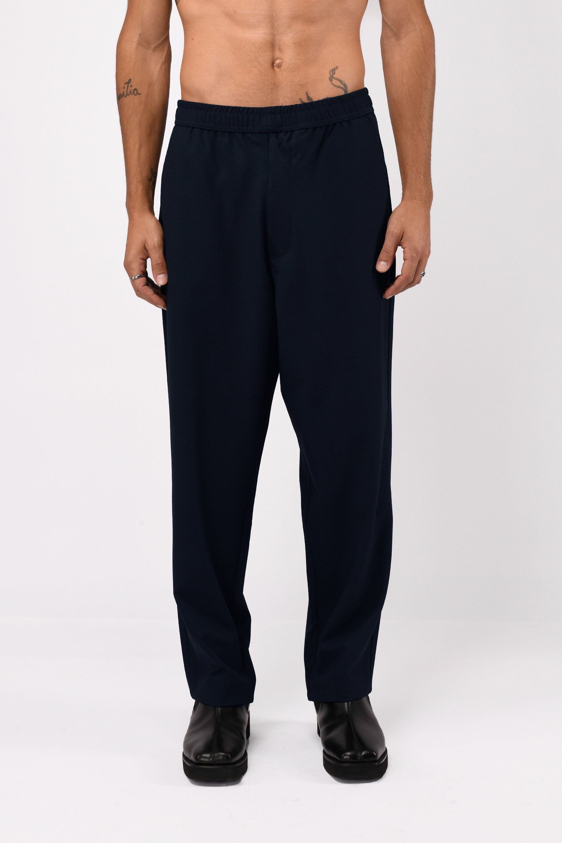 SUPREME FLOW RELAXED TROUSERS