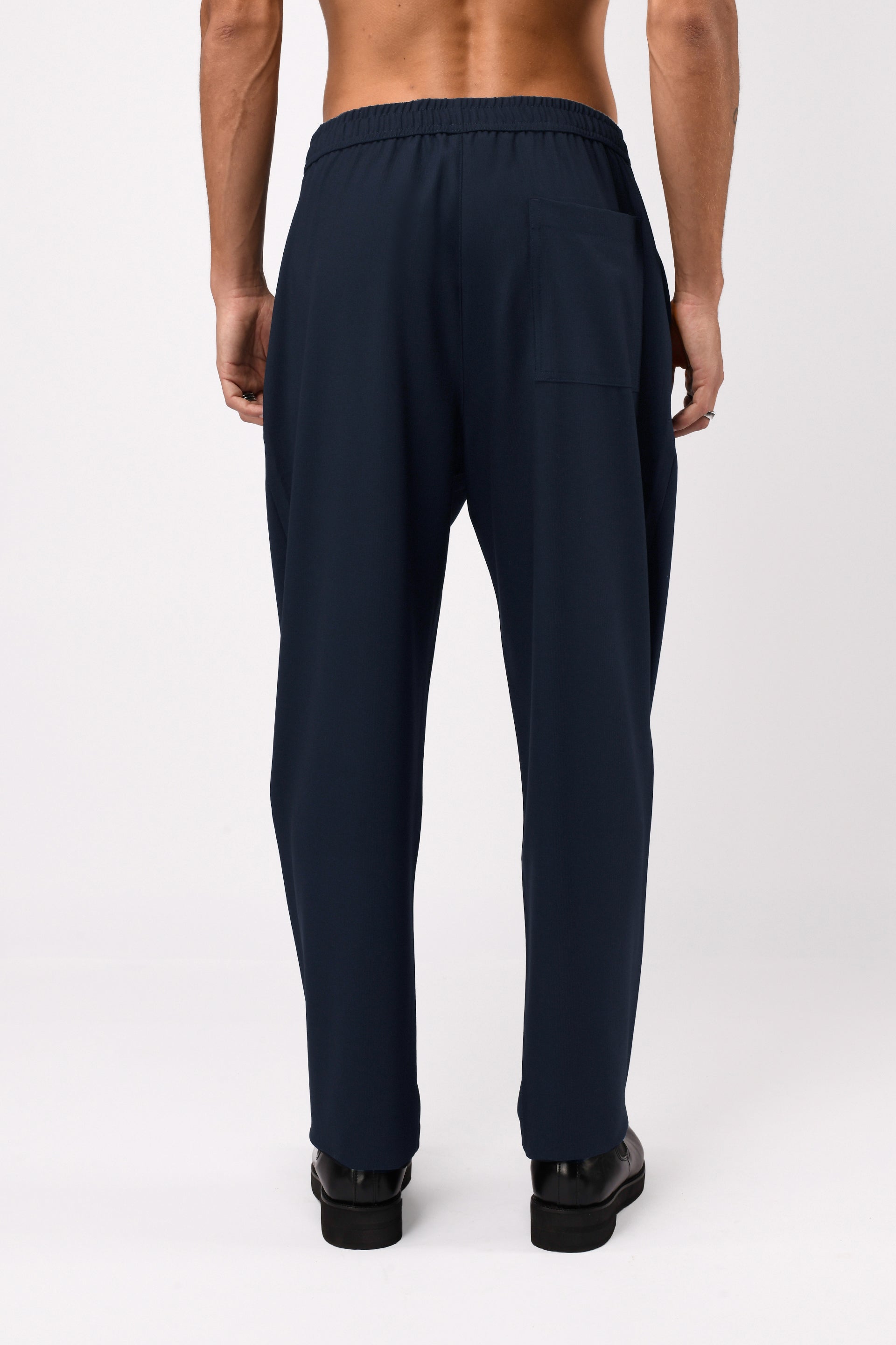 SUPREME FLOW RELAXED TROUSERS