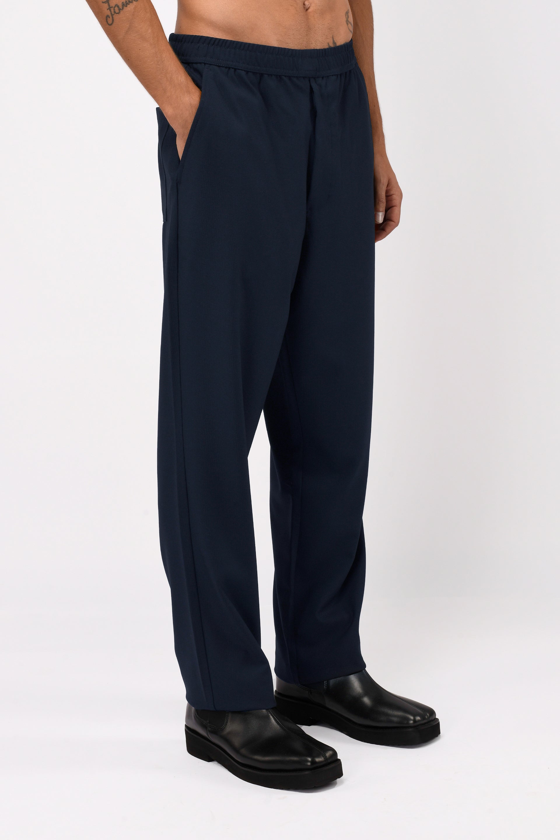 SUPREME FLOW RELAXED TROUSERS