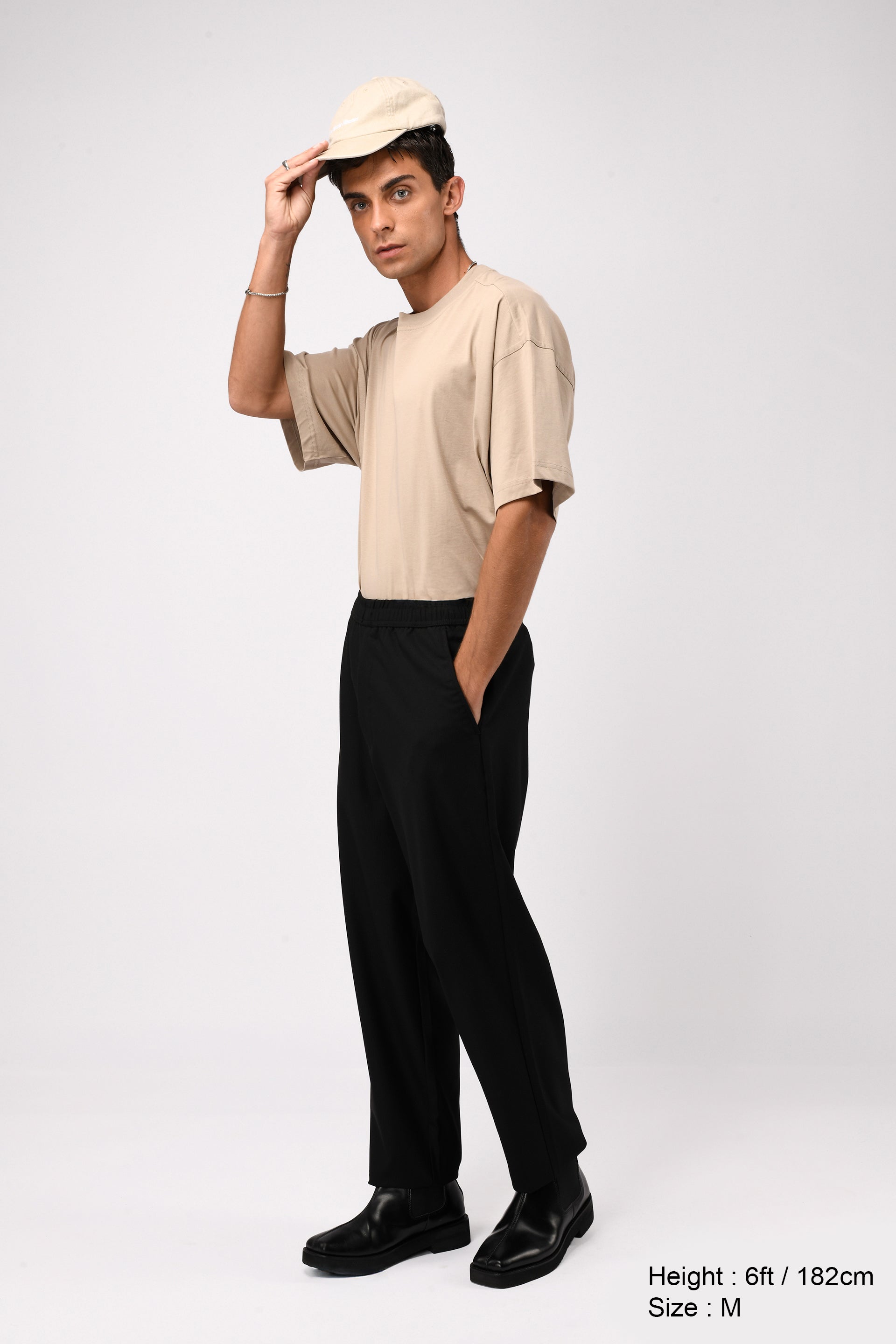 SUPREME FLOW RELAXED TROUSERS