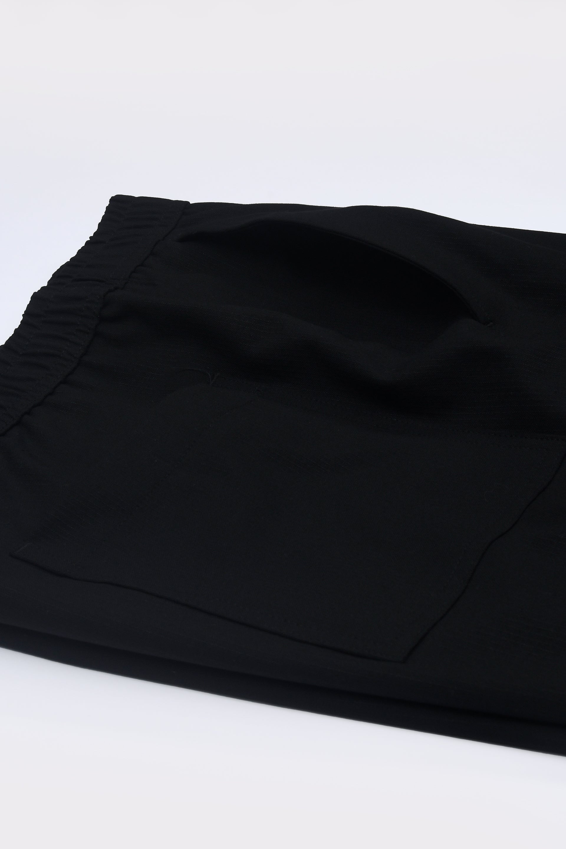 SUPREME FLOW RELAXED TROUSERS