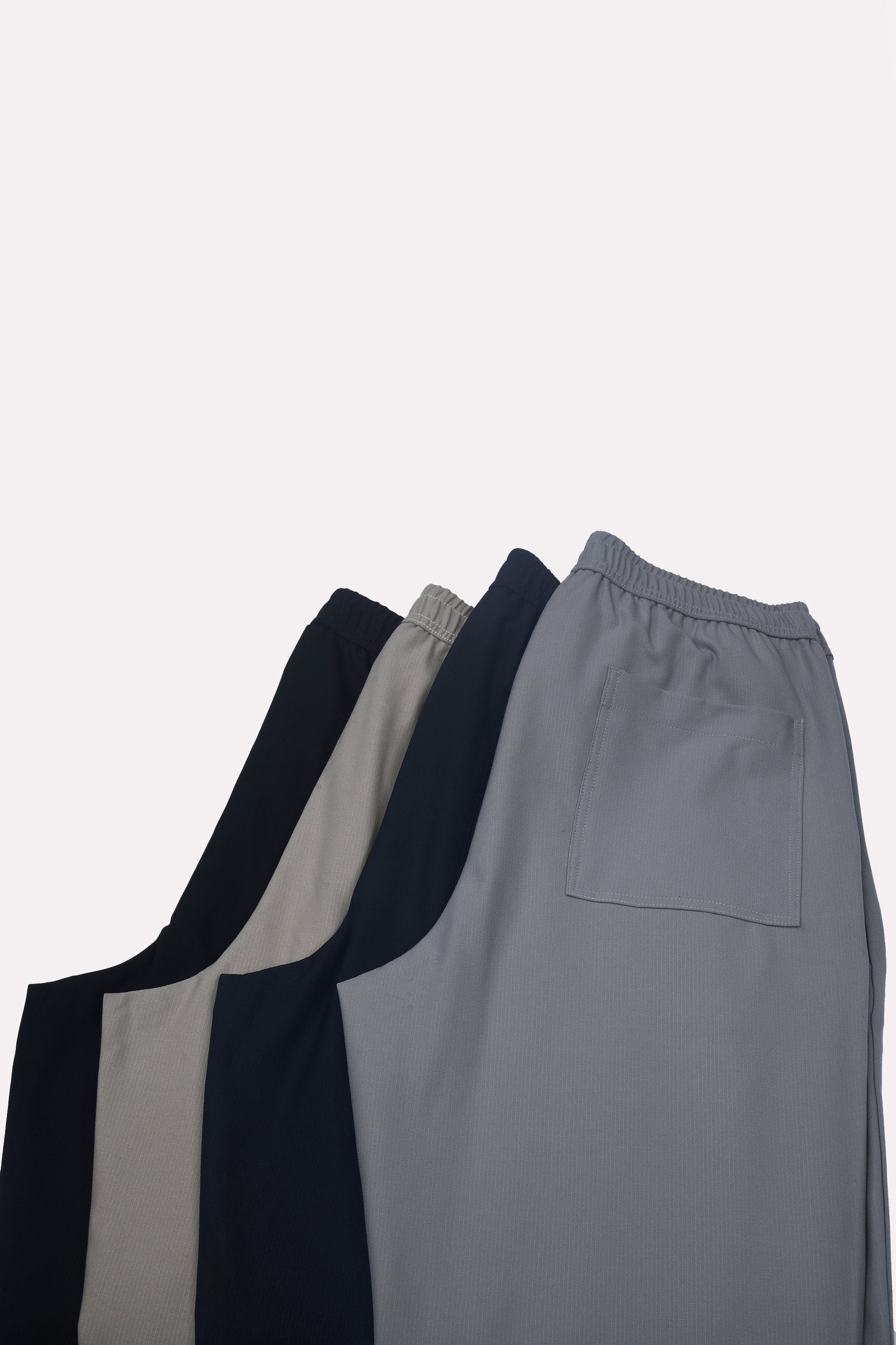 SUPREME FLOW RELAXED TROUSERS