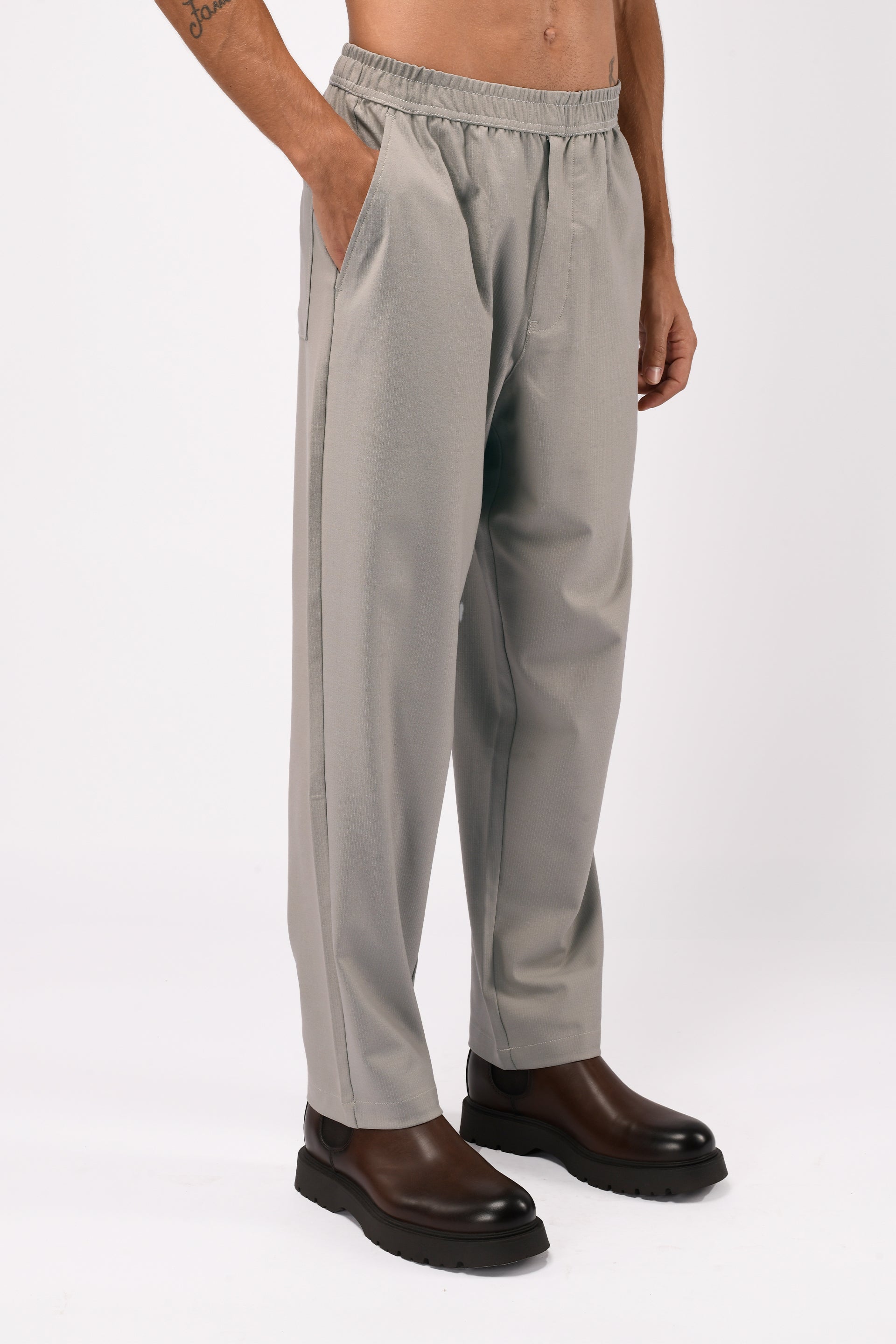 SUPREME FLOW RELAXED TROUSERS