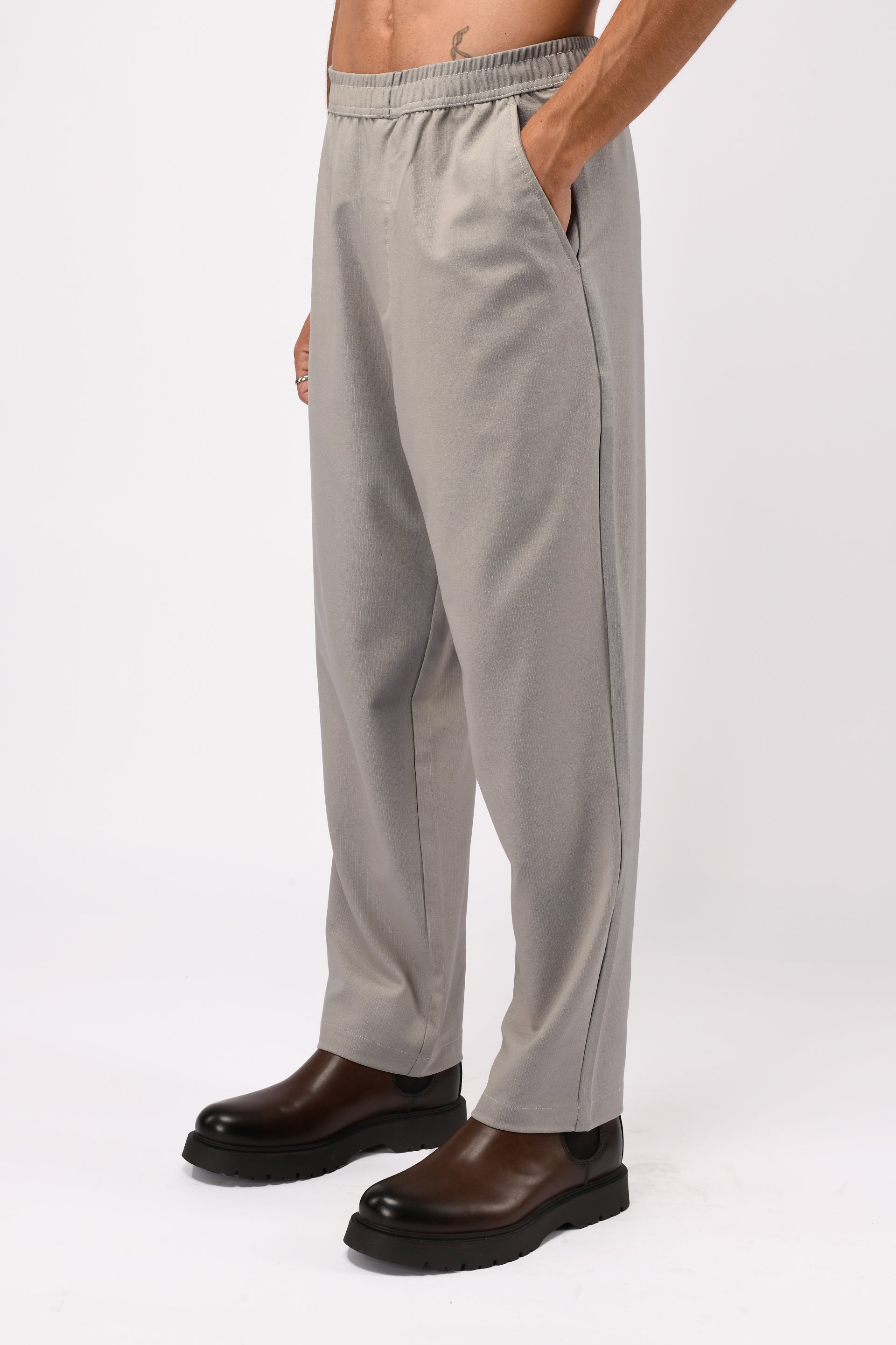 SUPREME FLOW RELAXED TROUSERS