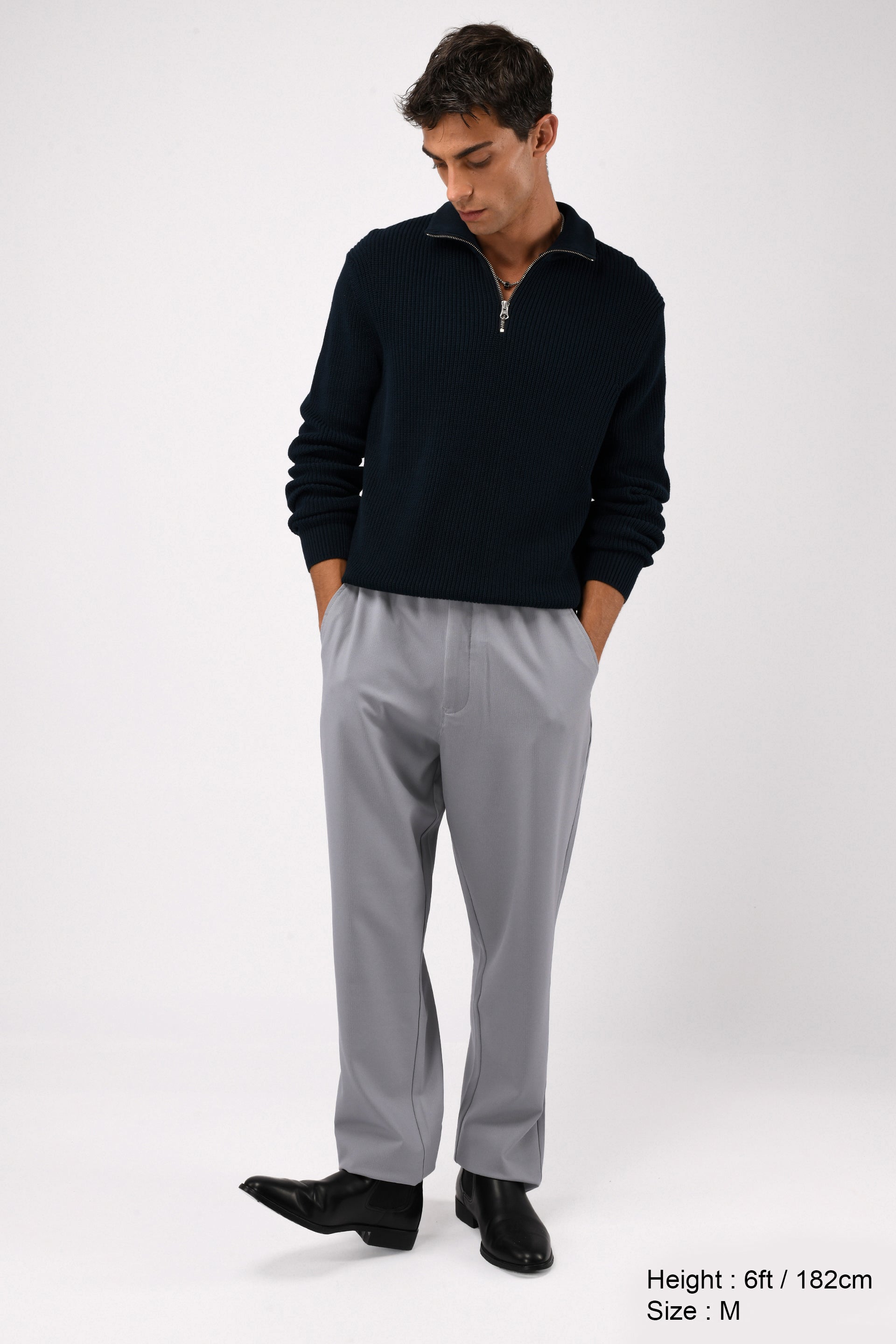 SUPREME FLOW RELAXED TROUSERS