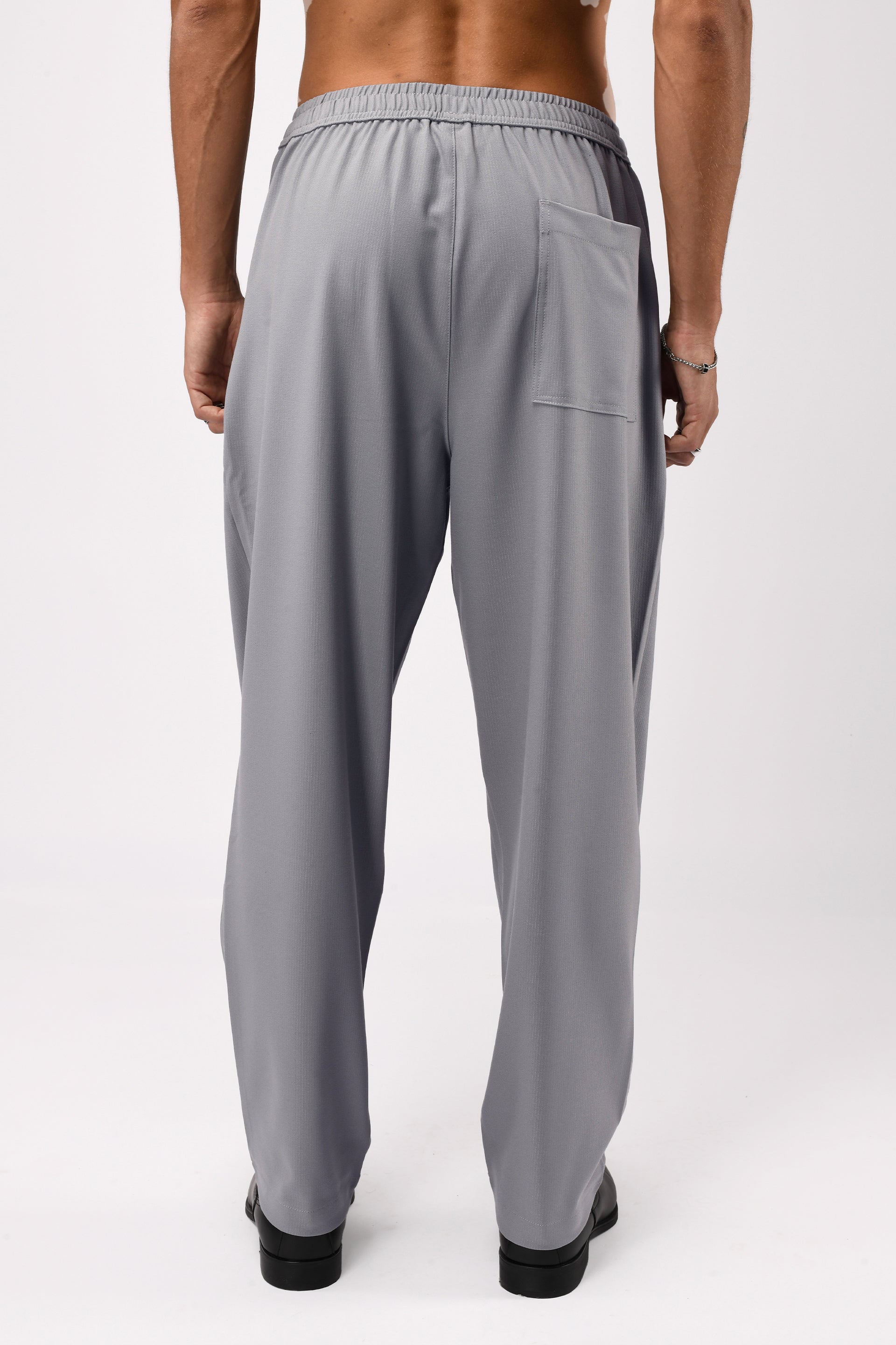 SUPREME FLOW RELAXED TROUSERS