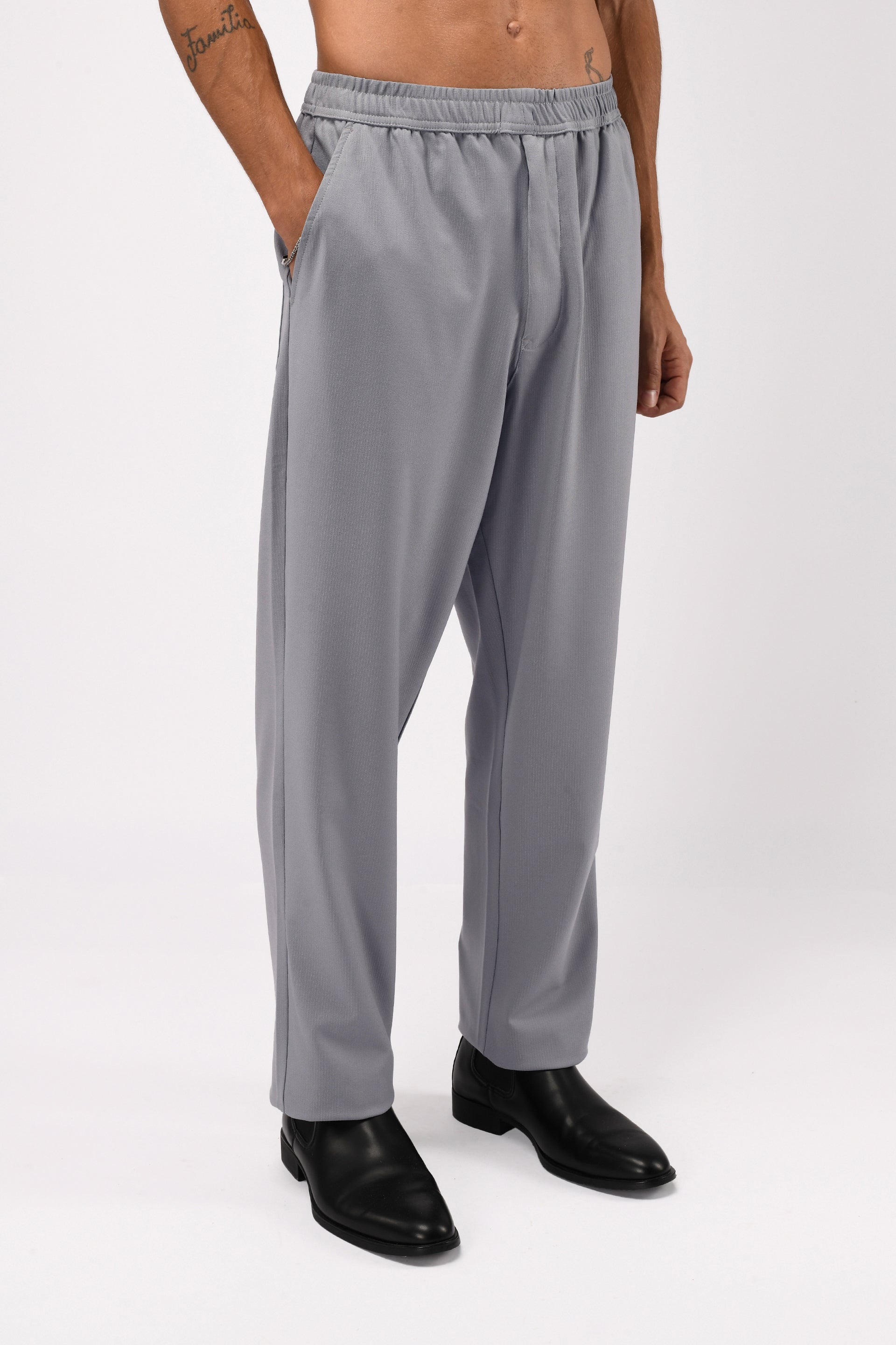 SUPREME FLOW RELAXED TROUSERS