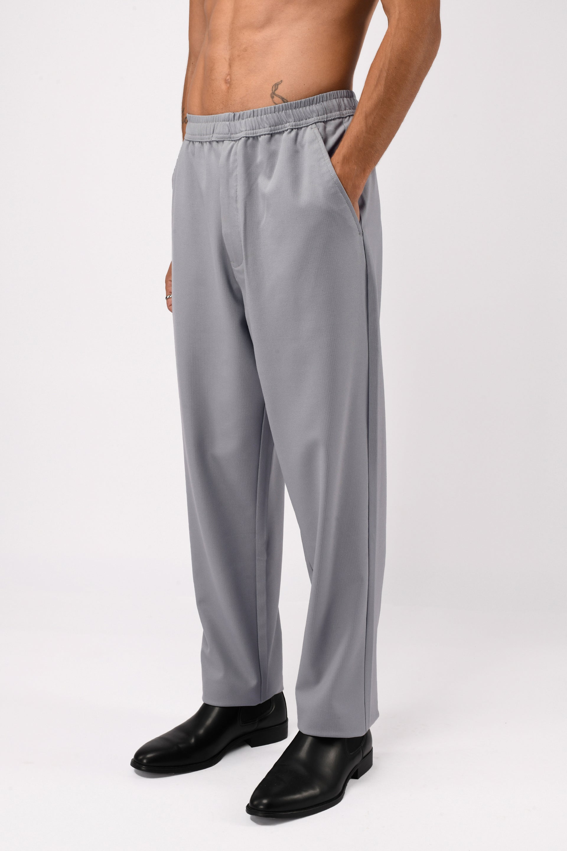 SUPREME FLOW RELAXED TROUSERS