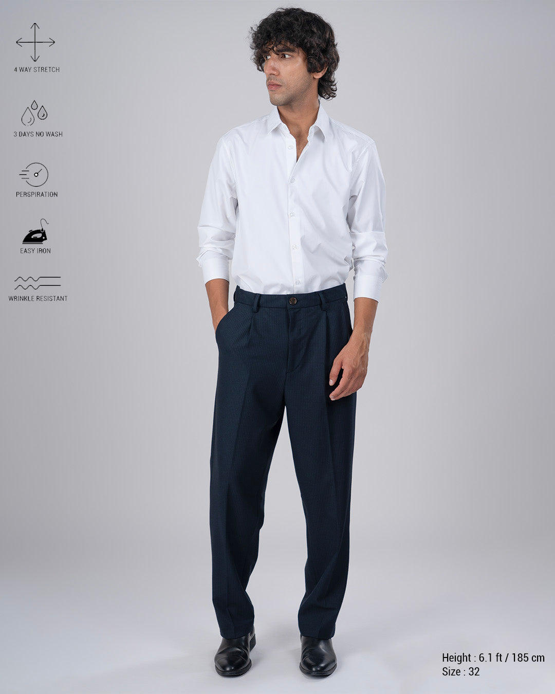 Easy Iron Pinstriped Relaxed Trousers In Navy