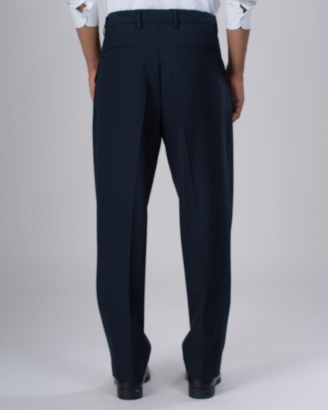 Easy Iron Pinstriped Relaxed Trousers In Navy