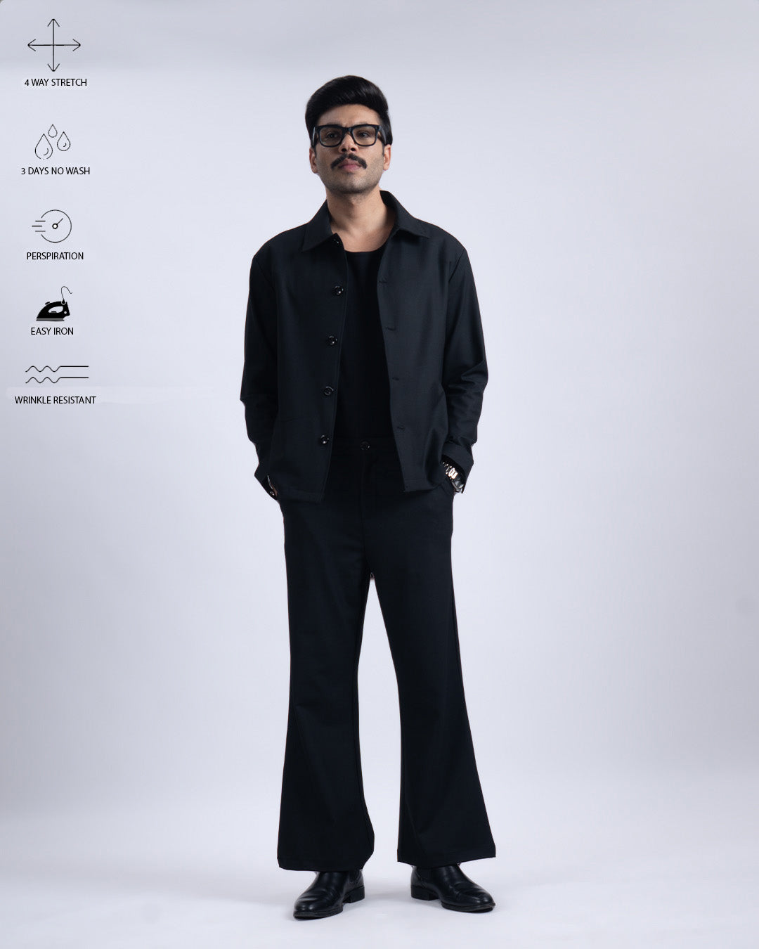 Easy Iron Bell Bottom Relaxed Trousers In Black