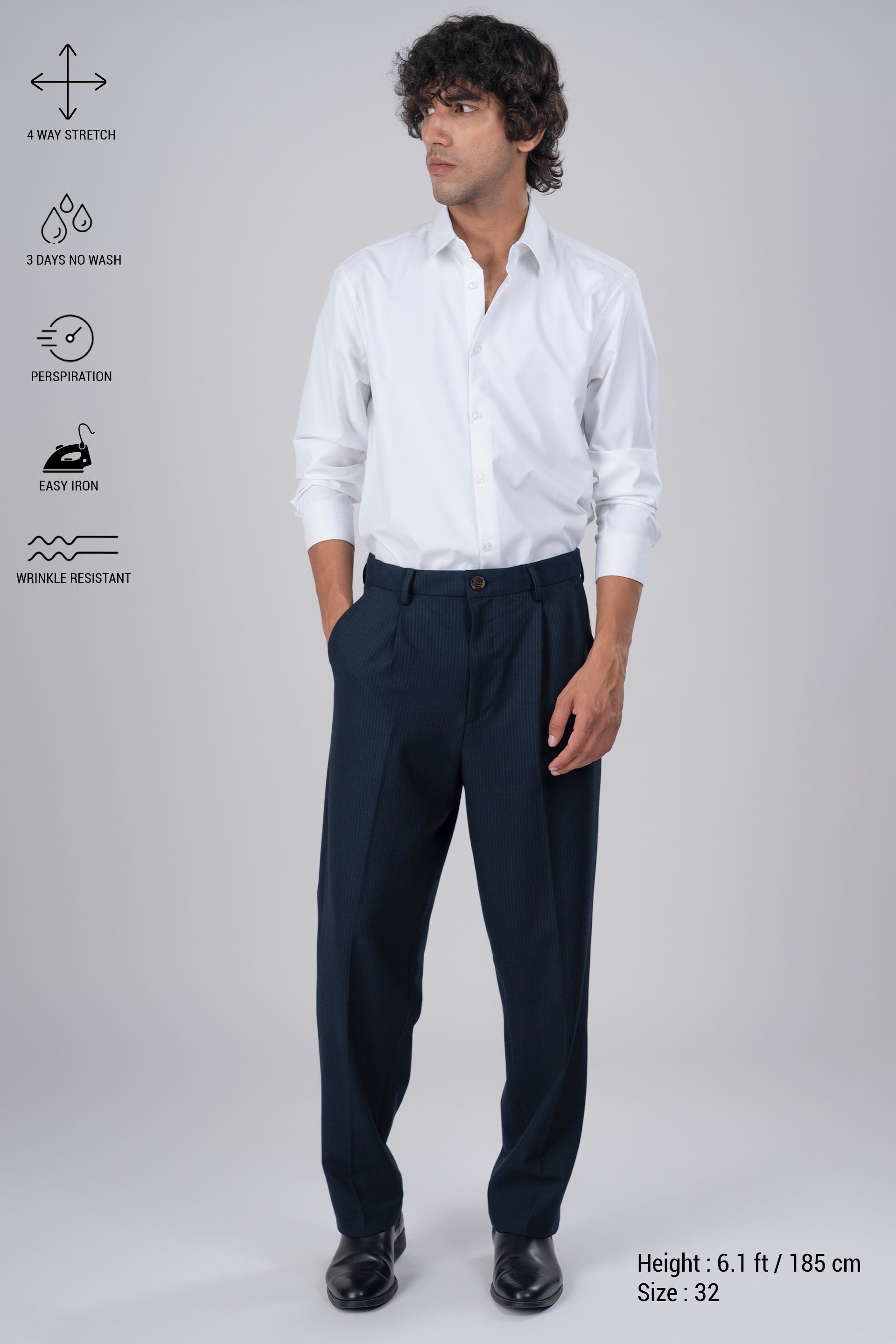 Easy Iron Pinstriped Relaxed Trousers In Navy