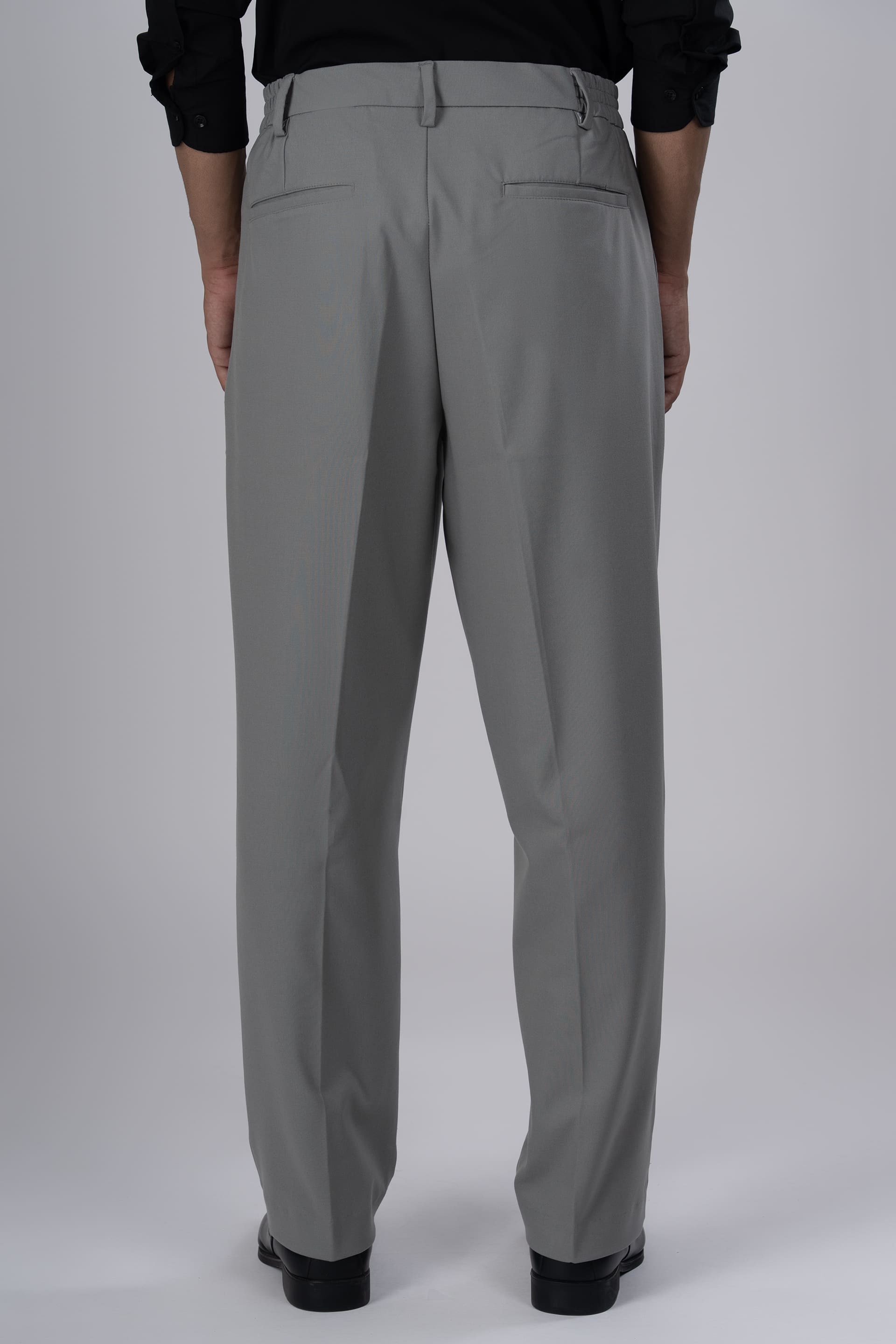 Tailoraedge Easy Iron Relaxed Pleated Trousers In Grey, Back Image of the Trousers.
