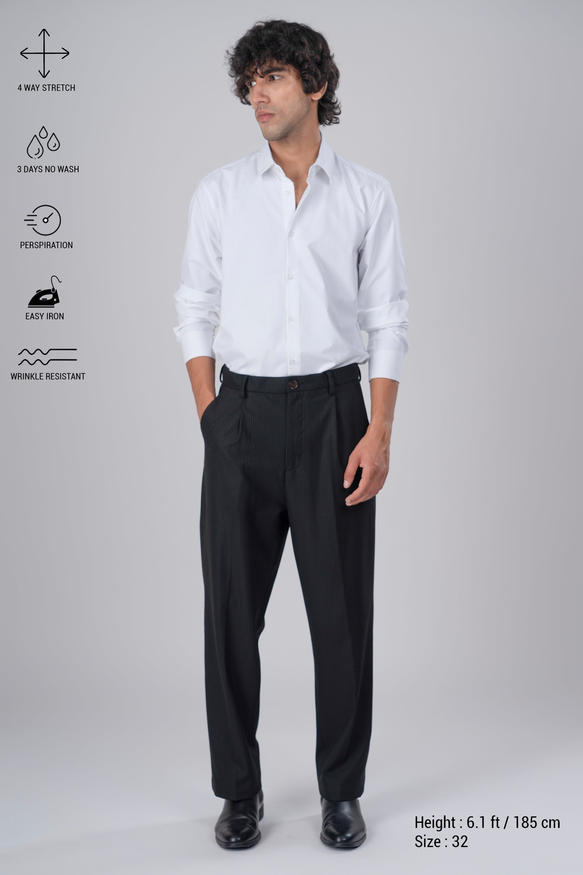 Easy Iron Pinstriped Relaxed Trousers In Black